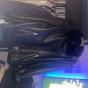 Black large leather jacket. Soft inside